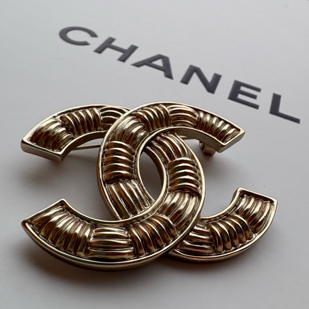 Vintage CHANEL Gold Textured Brooch